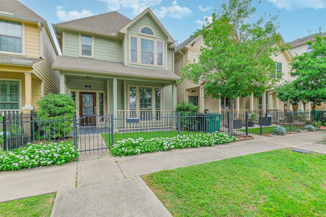 231 W 26th St, Houston, TX 77008 - view of front of house featuring a porch and a gate