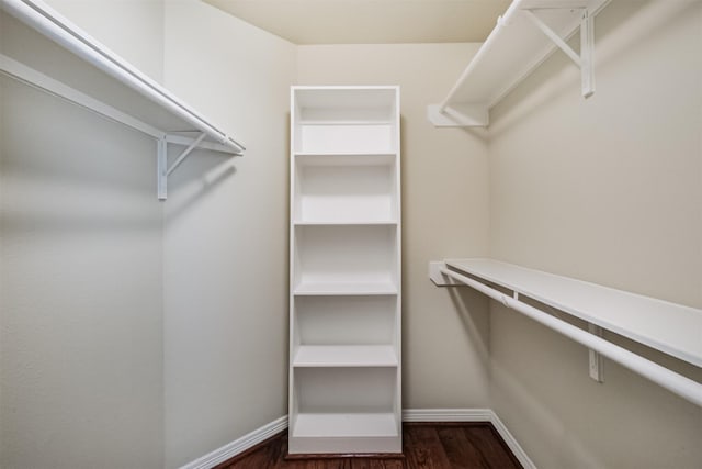 231 W 26th St, Houston, TX 77008 - walk in closet with dark wood finished floors