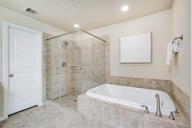 231 W 26th St, Houston, TX 77008 - full bath with a bath, a stall shower, and recessed lighting