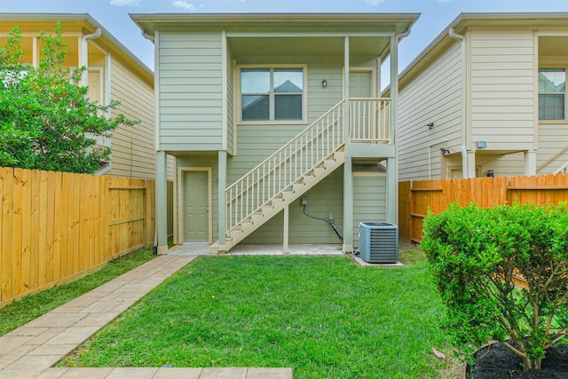 231 W 26th St, Houston, TX 77008 - rear view of house featuring stairway and cooling unit