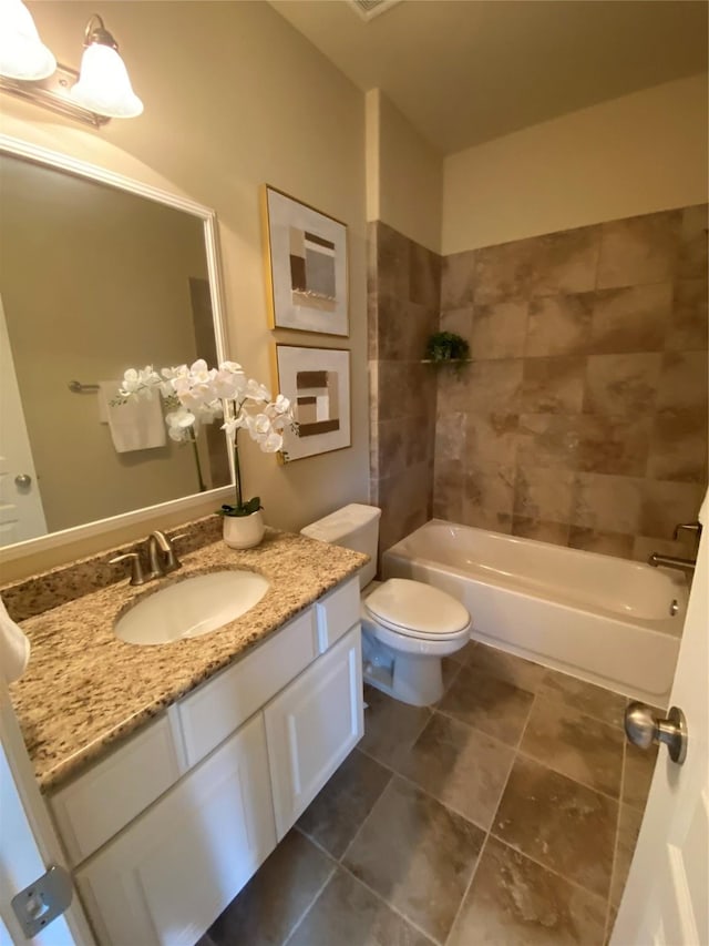 231 W 26th St, Houston, TX 77008 - bathroom with vanity, toilet, and tile patterned floors