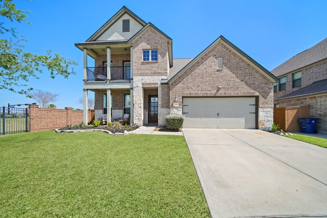 3214 Red Pebble Ln, Texas City, TX 77568 - view of front of property with a balcony, brick siding, concrete driveway, an attached garage, and stone siding