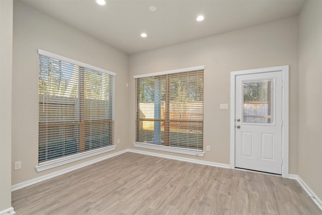 119 Lukewood Cir, Conroe, TX 77318 - foyer with light wood-style flooring, baseboards, and recessed lighting