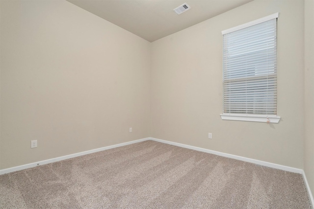 119 Lukewood Cir, Conroe, TX 77318 - unfurnished room with carpet, baseboards, and vaulted ceiling