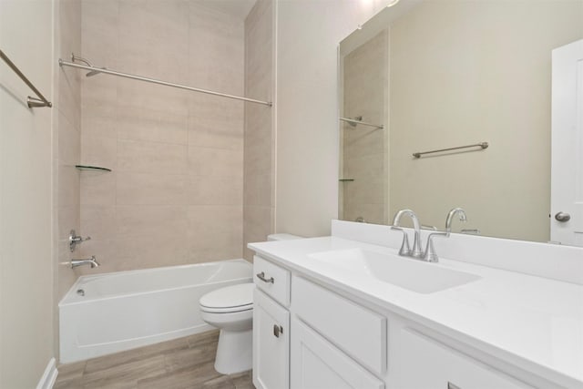 119 Lukewood Cir, Conroe, TX 77318 - full bathroom with toilet, wood finished floors, vanity, and  shower combination