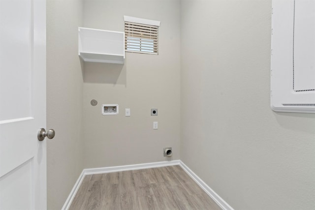 119 Lukewood Cir, Conroe, TX 77318 - washroom with electric dryer hookup, hookup for a washing machine, light wood-style flooring, and baseboards