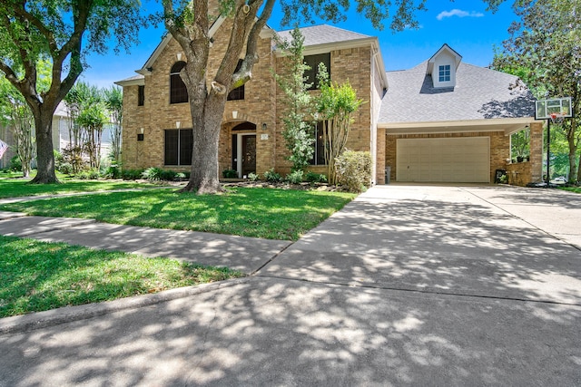 3006 Pecan Way Ct, Richmond, TX 77406 - traditional-style home with brick siding, a front yard, a garage, and driveway