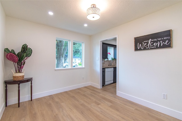 822 Red Rock Canyon Dr, Katy, TX 77450 - empty room with light wood finished floors and recessed lighting