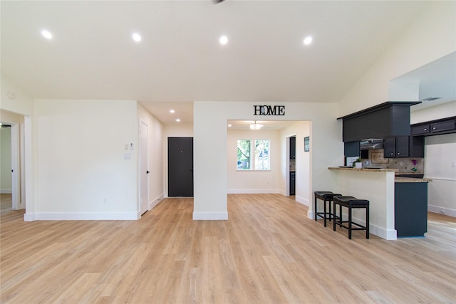 822 Red Rock Canyon Dr, Katy, TX 77450 - living room with light wood-style floors and recessed lighting