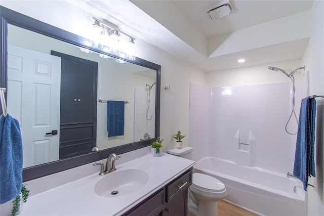 822 Red Rock Canyon Dr, Katy, TX 77450 - bathroom featuring vanity,  shower combination, wood finished floors, and recessed lighting