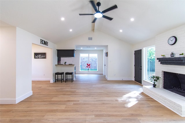 822 Red Rock Canyon Dr, Katy, TX 77450 - living room featuring a ceiling fan, a fireplace, light wood-type flooring, and recessed lighting