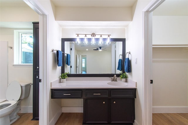 822 Red Rock Canyon Dr, Katy, TX 77450 - bathroom featuring wood finished floors, vanity, and a ceiling fan