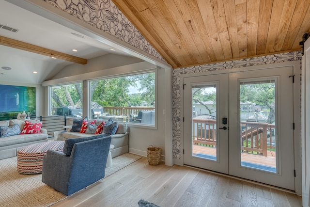 204 Blue Waters Dr, Horseshoe Bay, TX 78657 - living room with vaulted ceiling, french doors, plenty of natural light, wood-type flooring, and wood ceiling
