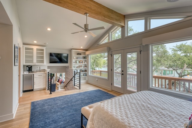204 Blue Waters Dr, Horseshoe Bay, TX 78657 - bedroom with refrigerator, access to exterior, recessed lighting, light wood-style floors, and beamed ceiling