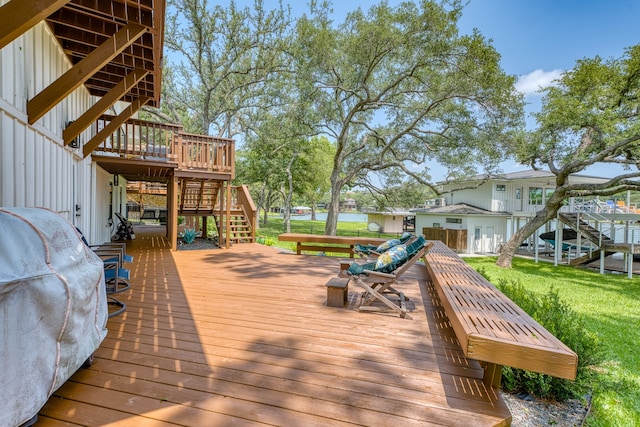 204 Blue Waters Dr, Horseshoe Bay, TX 78657 - wooden deck with stairs, a yard, and grilling area