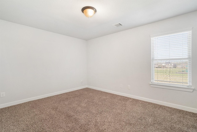 2715 Wembley Way, Rosenberg, TX 77471 - spare room featuring carpet flooring and baseboards