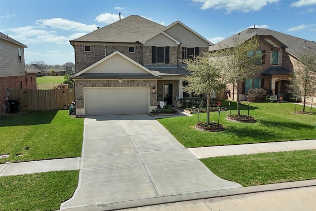 2715 Wembley Way, Rosenberg, TX 77471 - view of front of house with driveway, brick siding, an attached garage, and roof with shingles