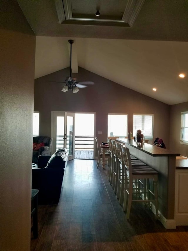 13015 Gulf Beach Dr, Freeport, TX 77541 - corridor with dark wood-type flooring, french doors, lofted ceiling, and recessed lighting