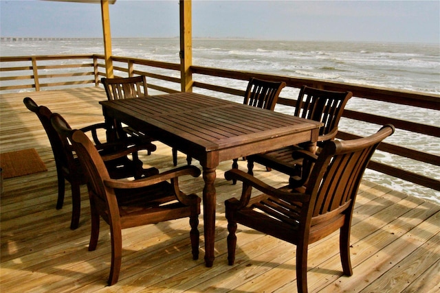 13015 Gulf Beach Dr, Freeport, TX 77541 - deck featuring a water view and outdoor dining area