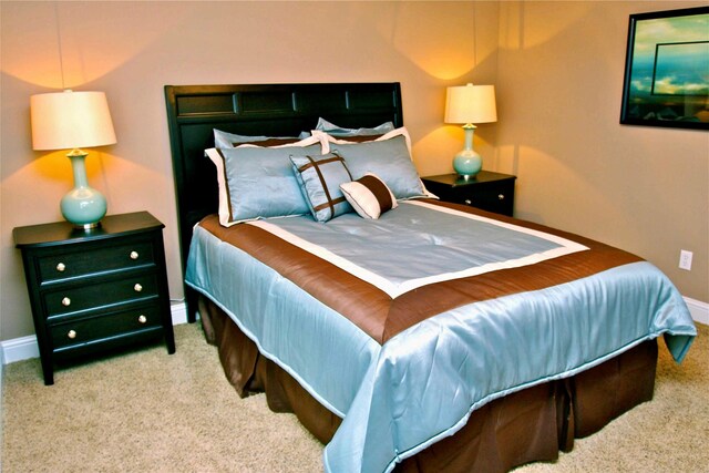 13015 Gulf Beach Dr, Freeport, TX 77541 - carpeted bedroom featuring baseboards