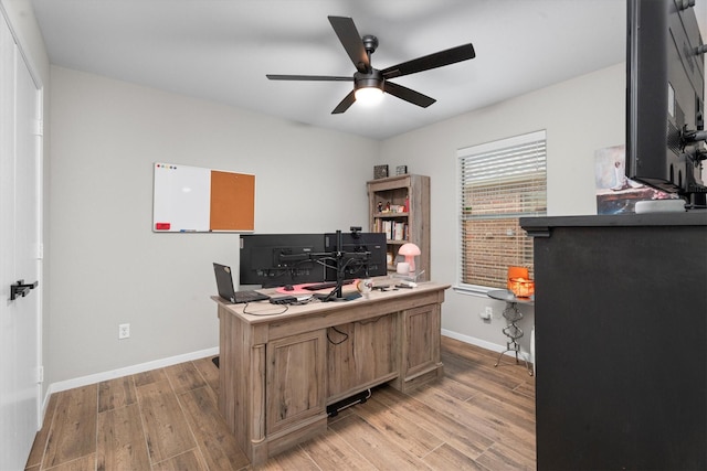 21343 Slate Crossing Ln, Katy, TX 77449 - home office featuring light wood-type flooring, a ceiling fan, and baseboards