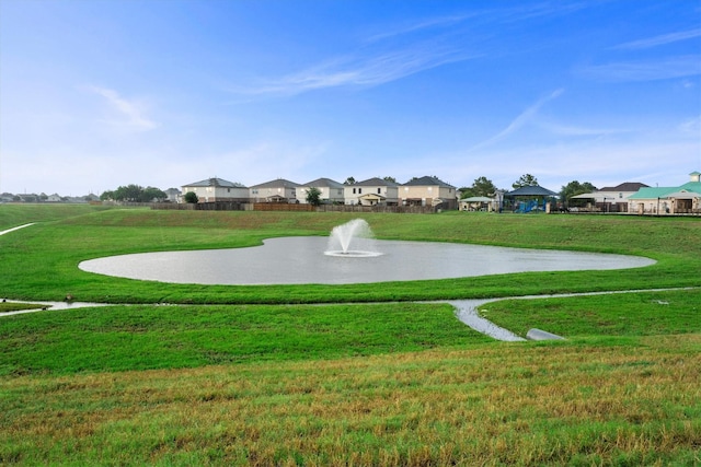 21343 Slate Crossing Ln, Katy, TX 77449 - view of community featuring a residential view, a yard, and a water view