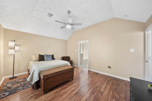 1497 Allison St, Alvin, TX 77511 - bedroom with vaulted ceiling, wood finished floors, baseboards, a ceiling fan, and ensuite bathroom