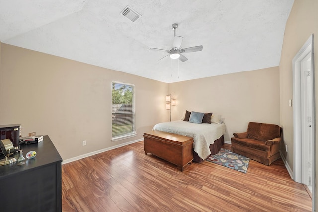 1497 Allison St, Alvin, TX 77511 - bedroom featuring wood finished floors, baseboards, and a ceiling fan