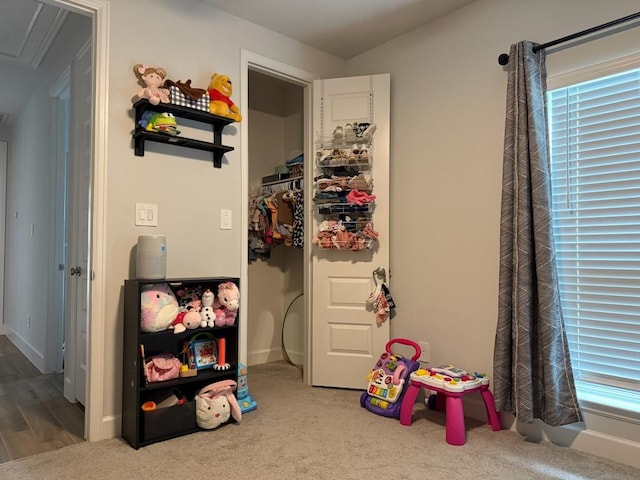 644 Sand Branch Dr, Conroe, TX 77304 - playroom featuring attic access, carpet flooring, and baseboards