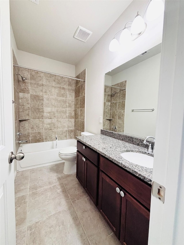 5130 Klein Orchard Dr, Houston, TX 77066 - bathroom with toilet, vanity, shower / bath combination, and tile patterned flooring