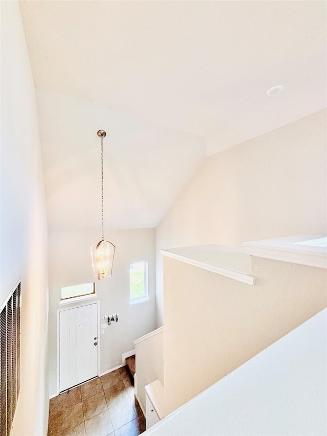 5130 Klein Orchard Dr, Houston, TX 77066 - entryway with vaulted ceiling, a chandelier, and tile patterned floors