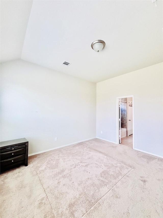5130 Klein Orchard Dr, Houston, TX 77066 - unfurnished bedroom with carpet flooring, baseboards, and lofted ceiling