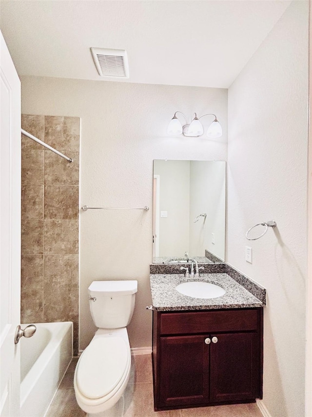 5130 Klein Orchard Dr, Houston, TX 77066 - bathroom with vanity, toilet, washtub / shower combination, and baseboards