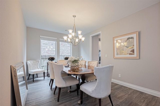 27923 Coulter Dr, Spring, TX 77386 - dining area featuring a chandelier and dark wood-type flooring