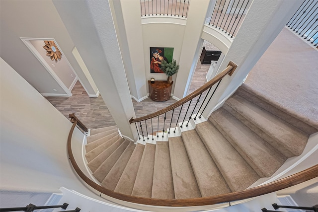 27923 Coulter Dr, Spring, TX 77386 - staircase with baseboards and a high ceiling