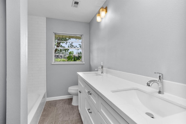 3919 Gardendale Dr, Houston, TX 77092 - full bath featuring double vanity, toilet, and baseboards