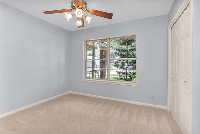 3919 Gardendale Dr, Houston, TX 77092 - unfurnished bedroom with carpet flooring, a closet, baseboards, and a ceiling fan