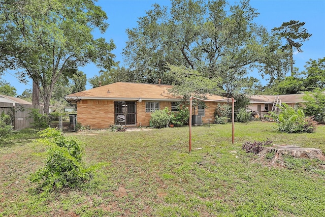 3919 Gardendale Dr, Houston, TX 77092 - rear view of house with a gate and central air condition unit