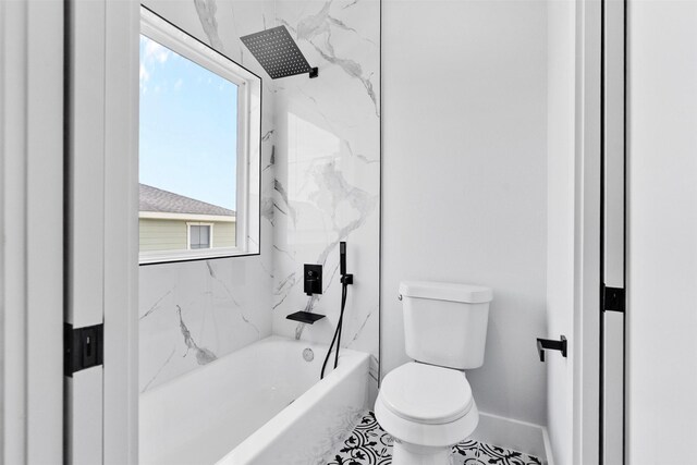6613 Ave O, Houston, TX 77011 - bathroom with baseboards and shower / bath combination