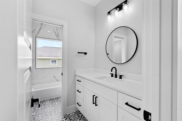 6613 Ave O, Houston, TX 77011 - full bathroom featuring vanity, a tub to relax in, and tile patterned floors