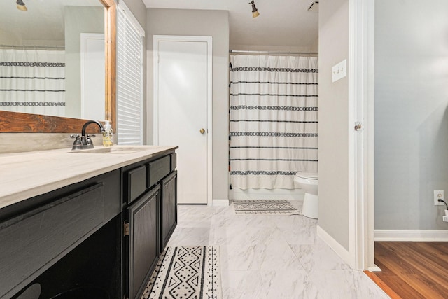 10922 Graywood Ct, La Porte, TX 77571 - bathroom featuring vanity, baseboards, toilet, and a shower with shower curtain