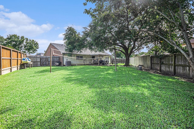10922 Graywood Ct, La Porte, TX 77571 - view of yard with central AC unit