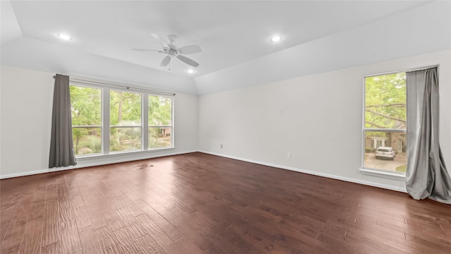 9710 Sotherloch Lake Dr, Spring, TX 77379 - spare room featuring a ceiling fan, healthy amount of natural light, lofted ceiling, dark wood-type flooring, and recessed lighting