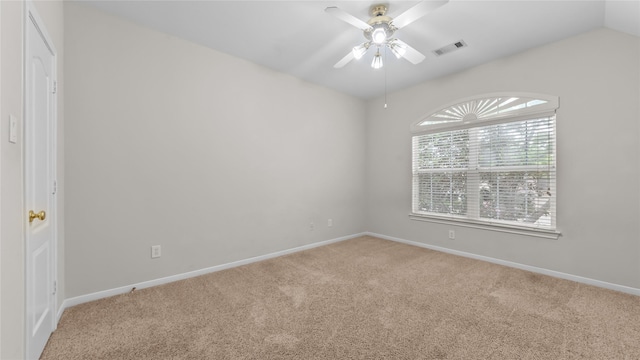 9710 Sotherloch Lake Dr, Spring, TX 77379 - unfurnished room with light carpet, a ceiling fan, baseboards, and vaulted ceiling