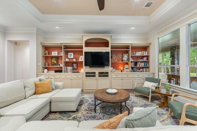 11710 Creek View Ln, Conroe, TX 77385 - living area featuring ornamental molding, ceiling fan, a tray ceiling, and recessed lighting