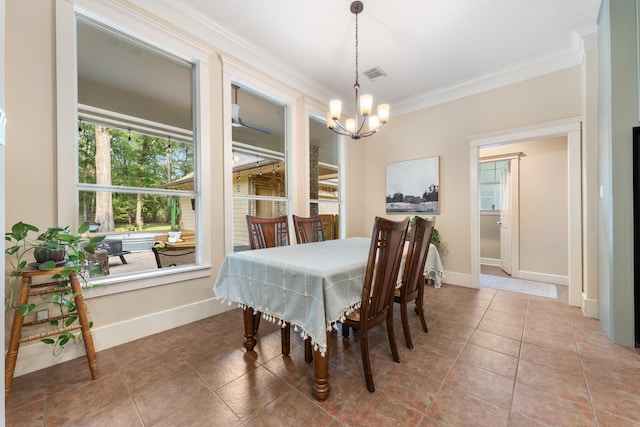 11710 Creek View Ln, Conroe, TX 77385 - tiled dining space with a chandelier, crown molding, and baseboards