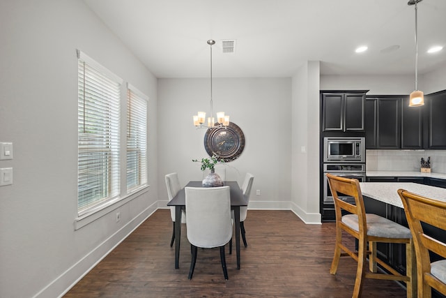 2027 Tarfite Pl, Houston, TX 77077 - dining space with plenty of natural light, a chandelier, dark wood-style floors, baseboards, and recessed lighting