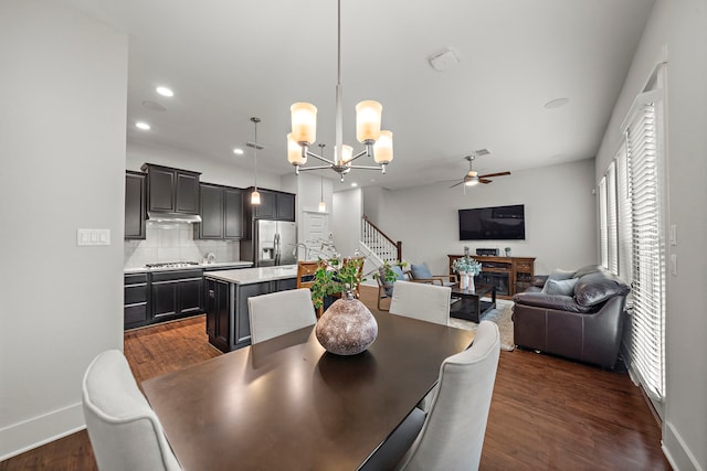 2027 Tarfite Pl, Houston, TX 77077 - dining space with ceiling fan, a chandelier, dark wood-style floors, baseboards, and recessed lighting
