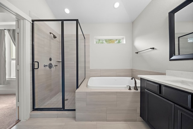 2027 Tarfite Pl, Houston, TX 77077 - full bath with a garden tub, vanity, a stall shower, recessed lighting, and tile patterned floors