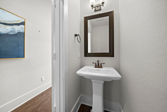 2027 Tarfite Pl, Houston, TX 77077 - bathroom with wood finished floors and baseboards